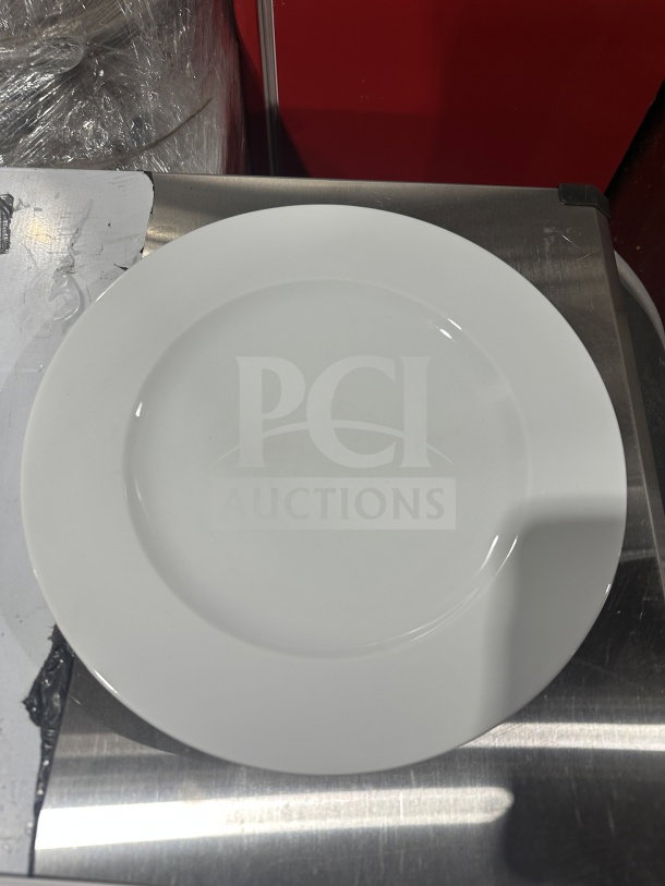 Brand new Gural Porselen 12.5" white porcelain plate, model D132DU00, with rolled edge and wide rim.