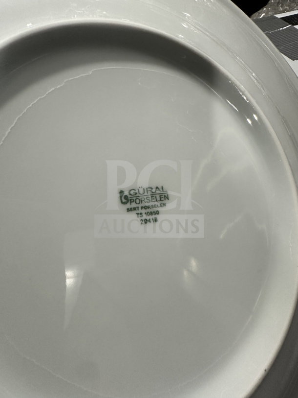 Brand new Gural Porselen 12.5" round white porcelain plate, model D132DU00, with rolled edge and wide rim.