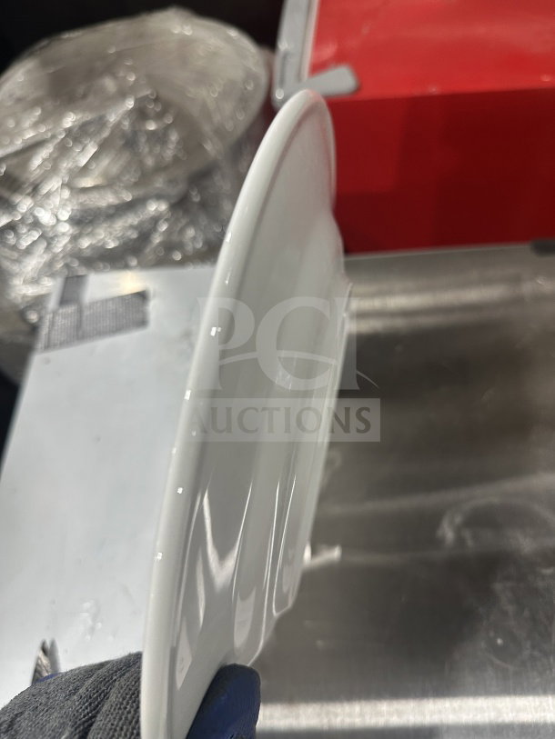 Brand new Gural Porselen 12.5" white porcelain plate, model D132DU00, with rolled edge and wide rim.