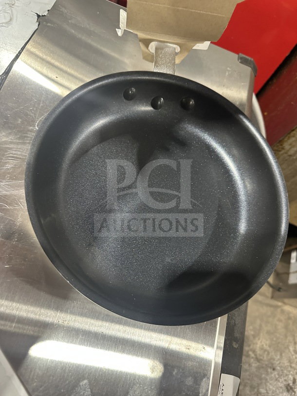 Brand new Winco 10" stainless steel non-stick fry pan, model AFP-0NS, with durable Quantum coating.
