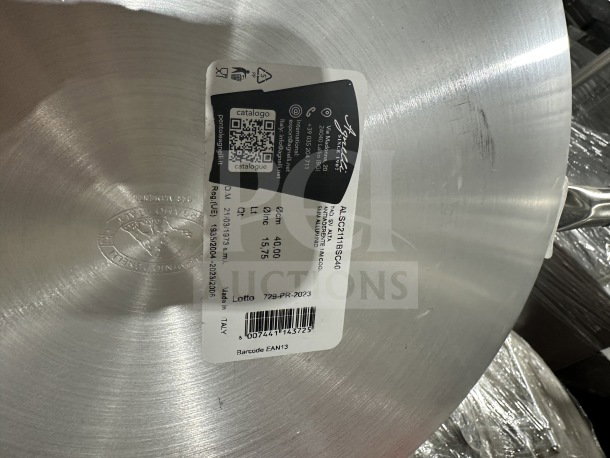 Winco Winware 10" stainless steel non-stick fry pan, Model AFP0NS, new, features embossed logo and product label indicating details.