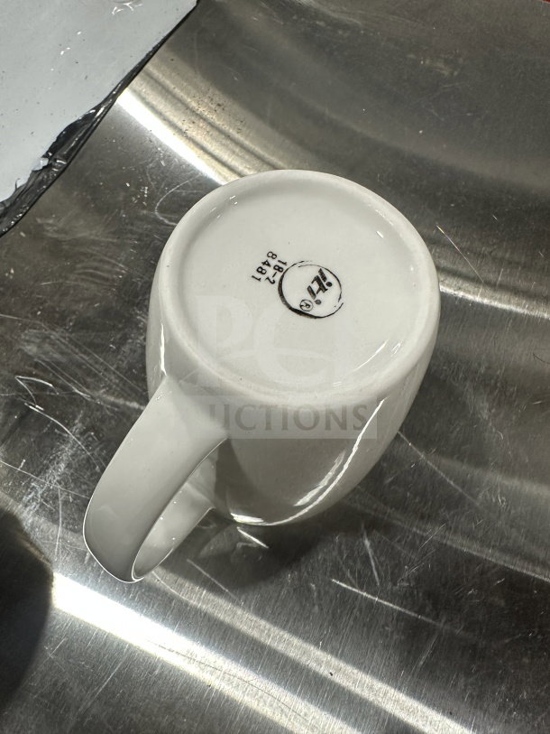 BRAND NEW Iti Commercial 12 OZ Porcelain White Mug, Model CP8481, features branding on base, in pristine condition.