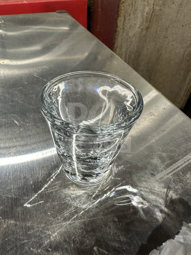 Brand new Anchor Hocking 1 oz clear glass whiskey shot glass, model 3668U. Durable commercial-grade glass, pristine condition.