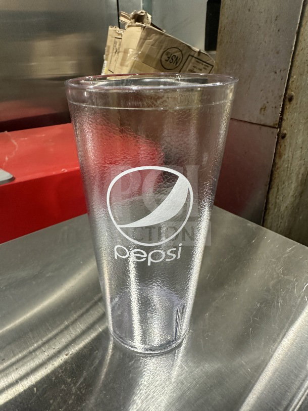 Brand new Pepsi 24 oz. clear pebbled tumbler, model 66241CP, features Pepsi logo. Sold in boxes of two dozen.