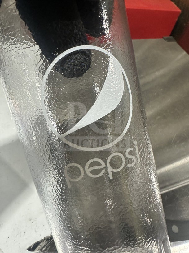 Brand new Pepsi 24 oz. clear pebbled tumbler, model 66241CP, features Pepsi logo, pristine condition.
