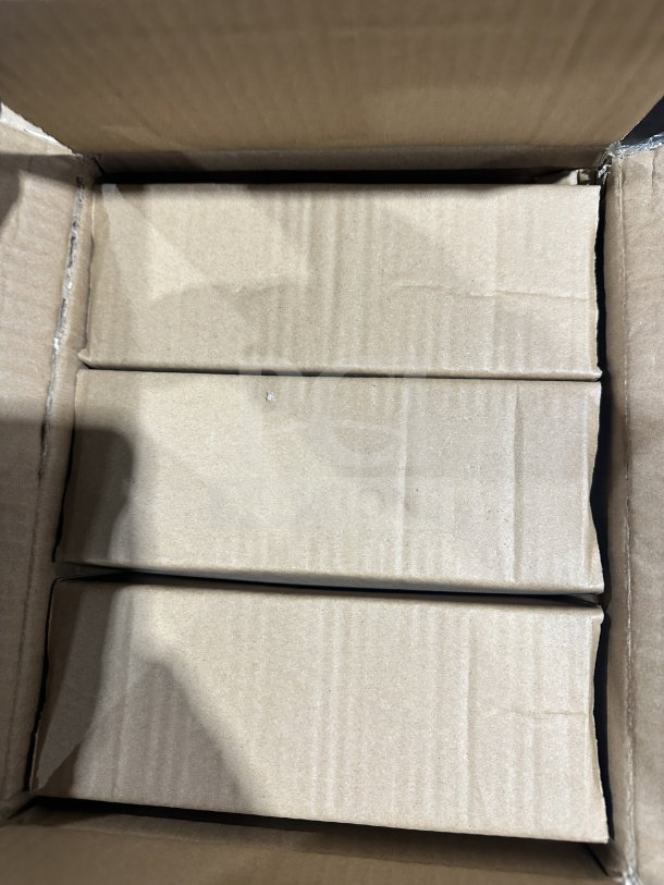 Box of 24 BRAND NEW Tuxon 9" vitrified china dinner plates, Model RFA-090, shown packaged and sealed in cardboard.