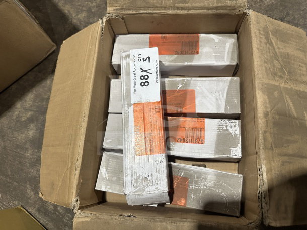 Box of brand new commercial 9.25" stainless steel dinner knives, 1 dozen per case, showing packaging and labels.