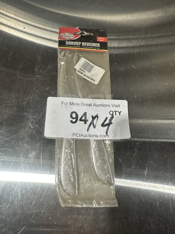 Brand new Winware SDA-7 commercial aluminum shrimp deveiner, 2 pieces per pack, in original packaging.