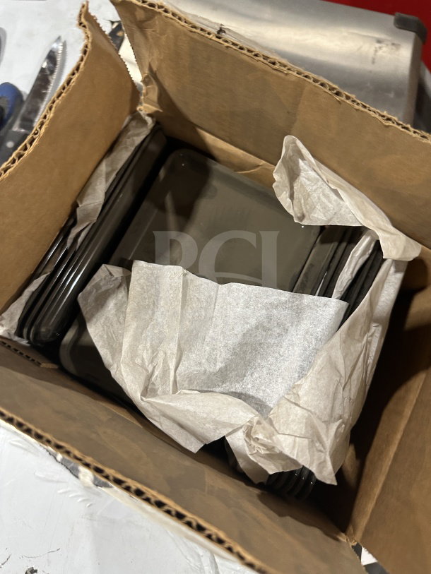 Brand new Carlisle black standard tip tray, model 302203, in original box with 36 pieces wrapped in tissue paper.