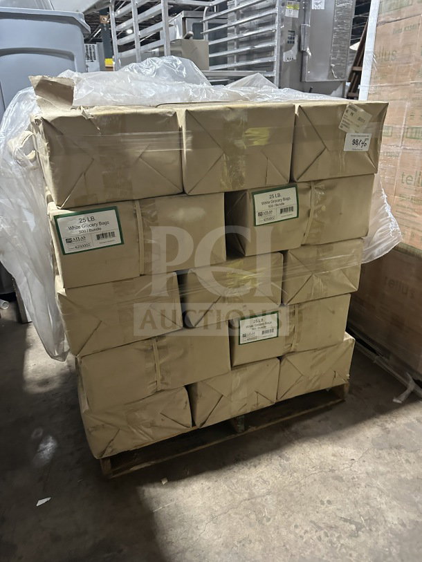 Brand new Atlas 25 LB paper grocery bags, model 4250002, 500 per box, stacked on a pallet in sealed packaging.