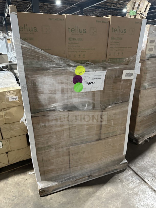Plastic-wrapped pallets of Tellus boxes labeled Item 433467 in a warehouse. Marked with brightly colored stickers and shipping labels.