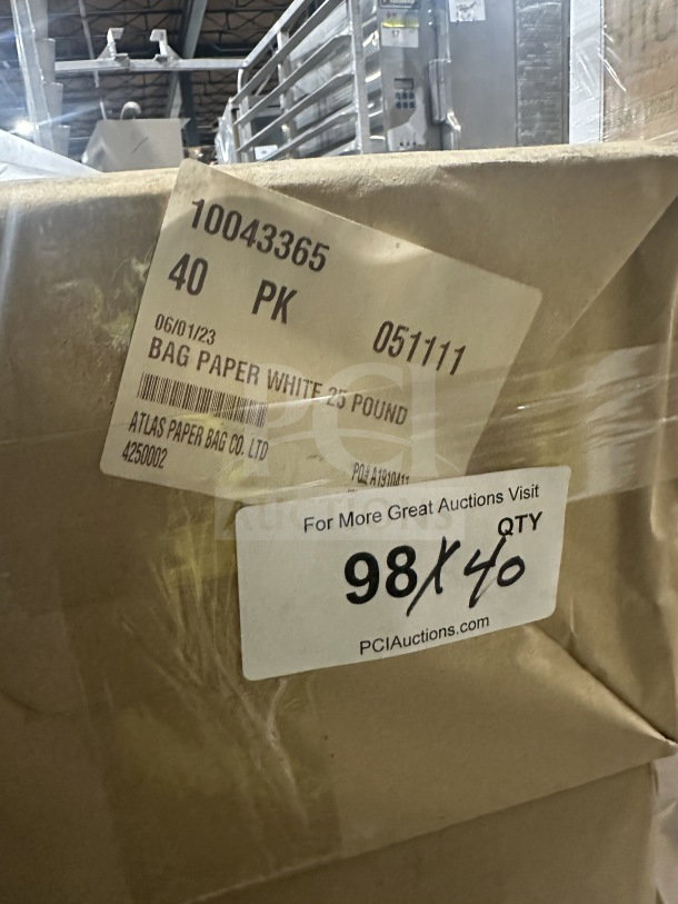 Brand new Atlas 25 LB commercial white paper grocery bag, model 4250002, 500 per box, packaged for auction.
