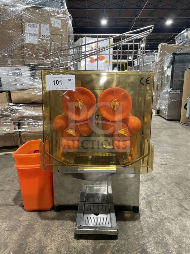 Zumex 2000E-2 electric orange juicer, brand new, 120V, commercial-grade, stainless steel, orange squeeze mechanism, countertop model.