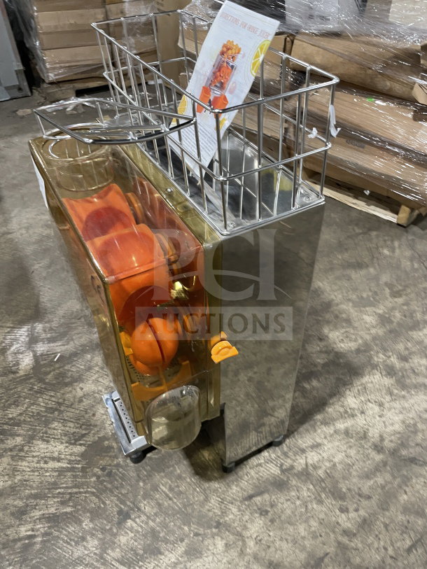 Brand new Zumex 2000E-2 orange juicer, electric-powered, stainless steel, countertop model, with orange squeezer.