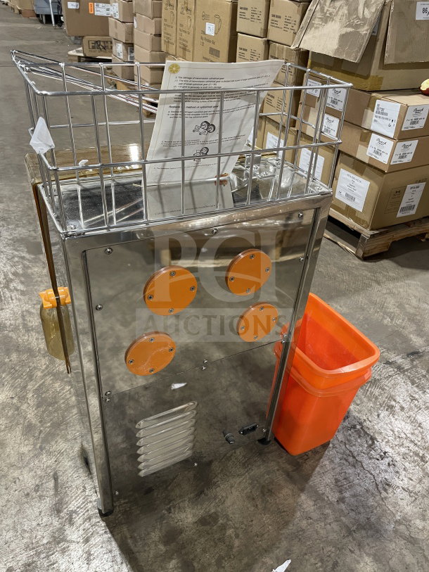 Brand new Zumex 2000E-2 commercial orange juicer, electric-powered, stainless steel, with orange components and basket.