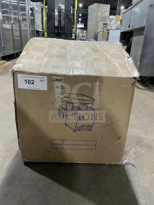 Brand new American Eagle AE-G12N heavy-duty stainless steel meat grinder in unopened box, model image and auction label visible.