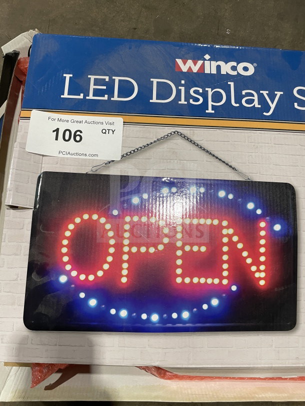 Winco LED "Open" Sign, Model LED6, new condition. Features bright LED lights, rectangular design, includes hanging chain.