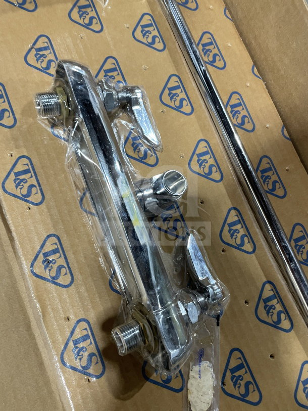 BRAND NEW T&S commercial brass wall-mount workboard mixing faucet with 12" swing nozzle, in original packaging.