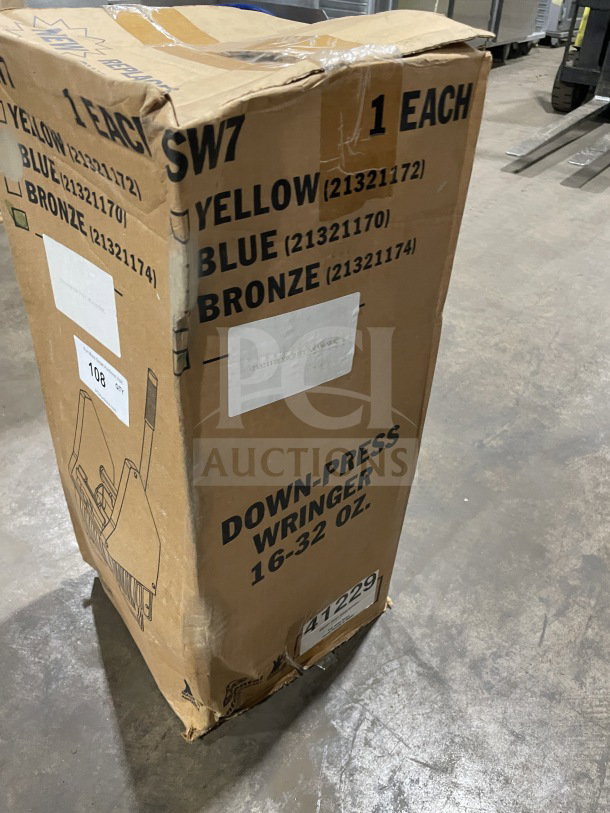 Boxed Continental Commercial Splash Guard Down-Press Wringer, brand new condition, item sizes 16-32 oz, marked SW7.