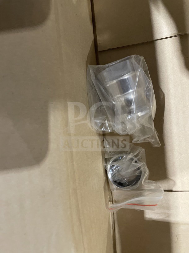 Brand new T&S 3.5" commercial sink waste valve, model B-3972, in packaging. Clear plastic wrap indicates unused condition.