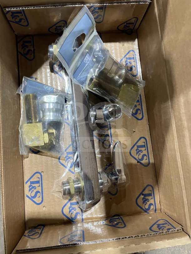 Brand new T&S commercial wall-mounted workboard base faucet, model B1125LN, packaged in original box with components.