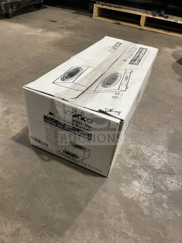 Alt text: Boxed Winco ECW-25 stainless steel double coffee decanter warmer, new condition, model and features labeled.