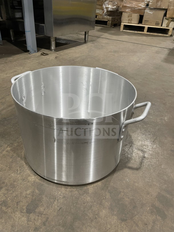 New Adcraft heavy-duty aluminum sauce pot with handles, commercial grade. Visible surface marks, large capacity.