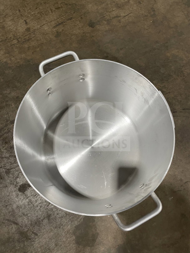 Brand new Adcraft commercial heavy-duty aluminum sauce pot with handles, showcasing durable construction.