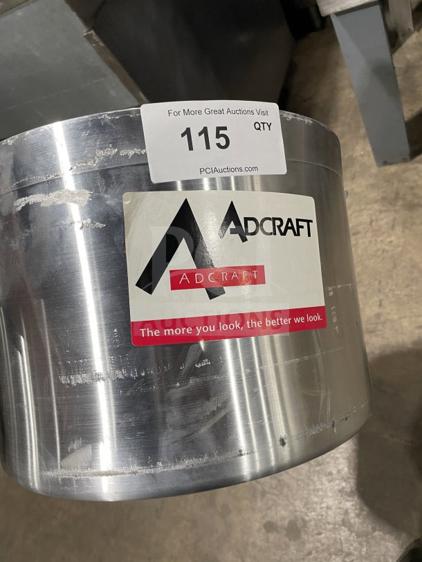 Brand new Adcraft commercial heavy-duty aluminum sauce pot with handles. Features Adcraft logo and auction tag.