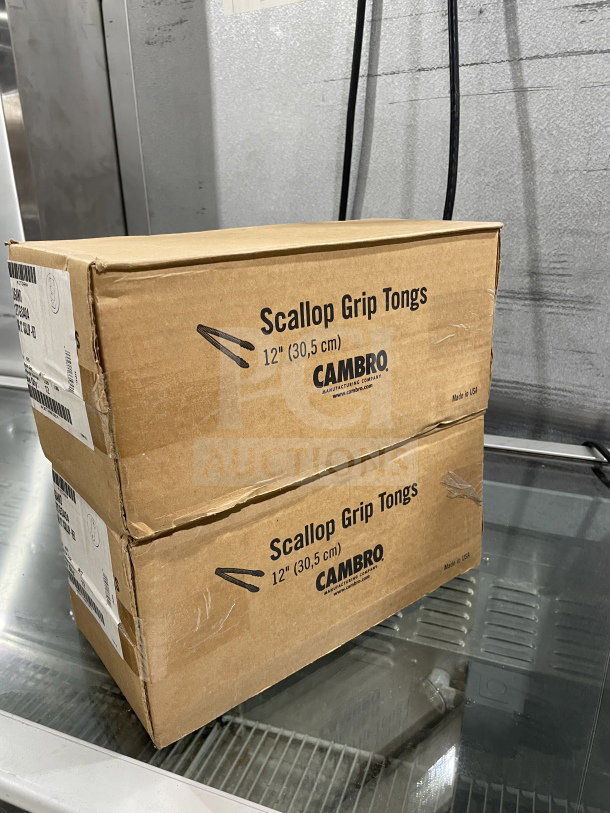 Boxes of Cambro Lugano Series 12" Scallop Grip Tongs, Model 12TGS404, red plastic, 12 tongs per box, new condition.