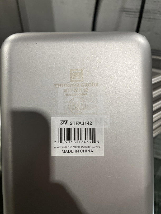 Brand new Thunder Group stainless steel steam table pan, model STPA3142, 24 gauge, quarter size, anti-jam, NSF certified.
