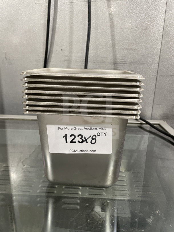 Brand new Amko Commercial Stainless Steel Steam Table Pan, Model STPA3142, shown stacked with label indicating quantity.