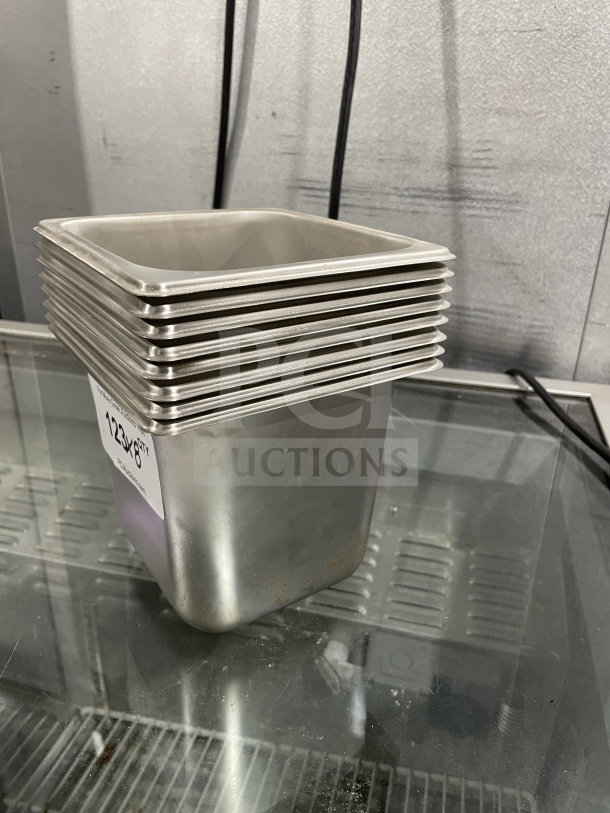 Brand new Amko stainless steel steam table pan, Model STPA3142. Stack of pans, perfect condition, auction lot 24606.