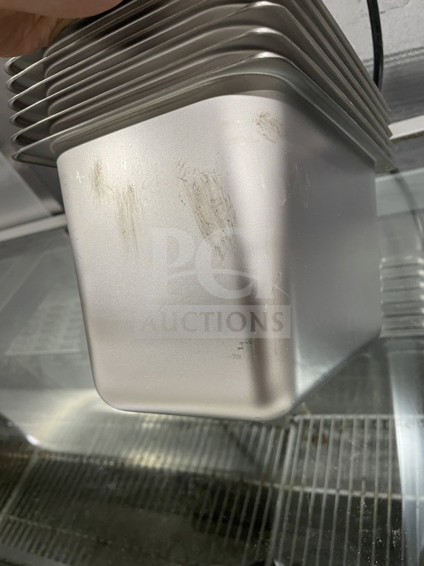 Amko stainless steel steam table pan, model 24406, brand new, quarter-size. Surface shows smudges. Serial: 608819481647.
