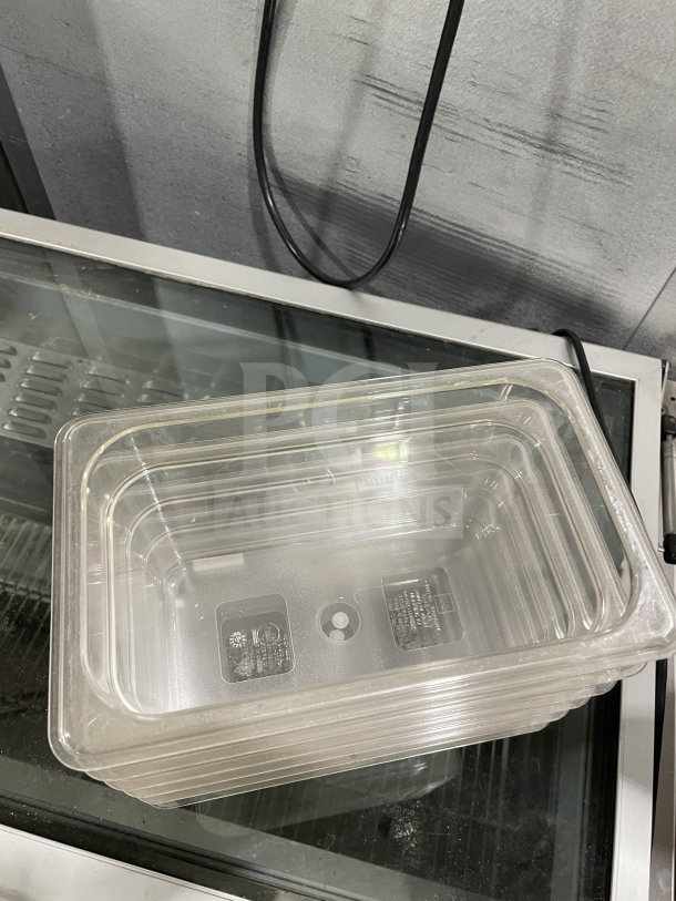 Brand new Thunder Group PLPA8146 polycarbonate food pan, 1/4 size, 6" deep, commercial-grade, clear, stackable design.