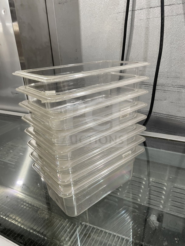 Brand new Thunder Group 6" polycarbonate food pans, model PLPA8146, stack of eight, clear, durable commercial quality.