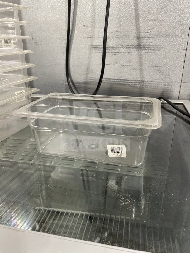 Brand new Thunder Group polycarbonate food pan, model PLPA8146, shown on display with item label visible.