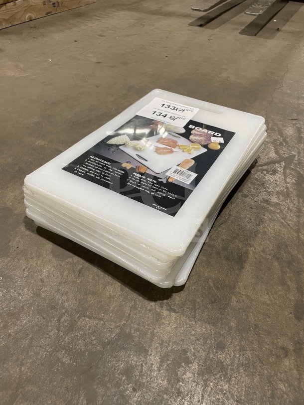 Brand new Thunder Group PLCB002 white non-skid cutting boards with handle holes, stack of multiple units, commercial grade.