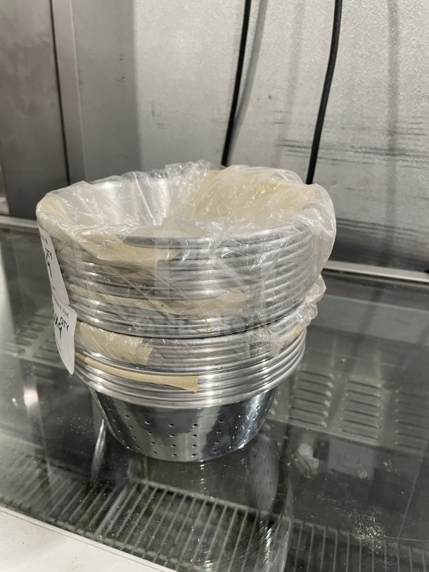 Brand new commercial 1/3" aluminum colander, wrapped in plastic, perforated, ideal for kitchen use.