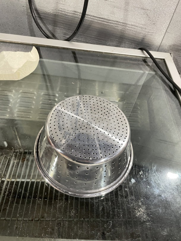 Brand new commercial 1/3" aluminum colander, perforated design, metallic finish, 9-inch diameter, ideal for kitchen use.