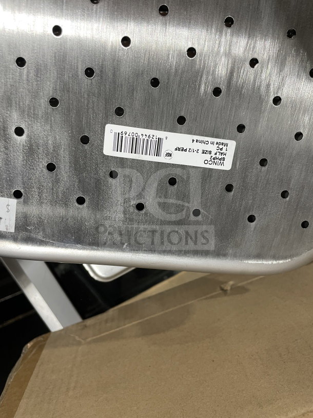 Winco SPHP2 stainless steel perforated steam pan, new condition, features 2-1/2" depth, visible brand label and serial number.