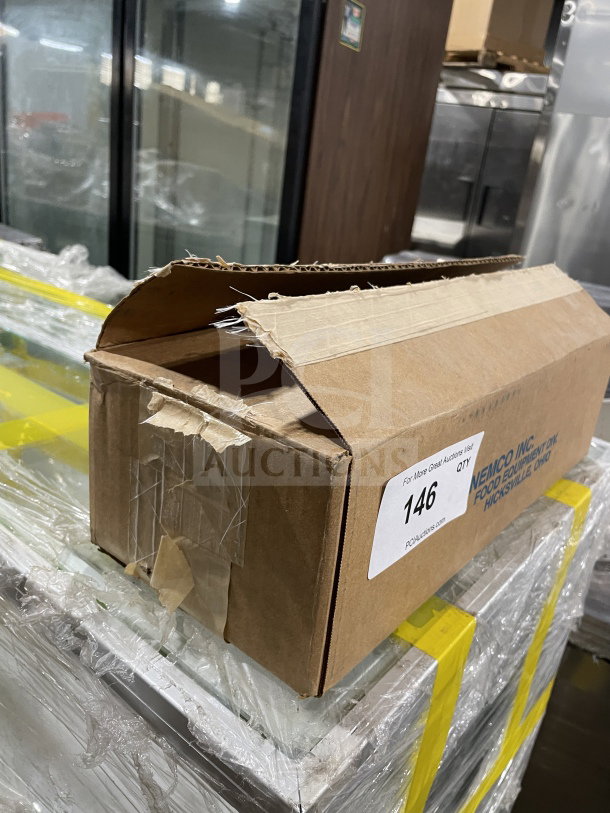 Nemco Model N55825 Easy Grill Scraper in box, new condition, with label indicating brand and auction site details.
