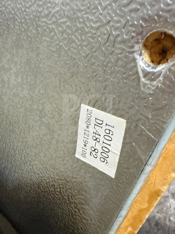 Continental model DL48-82 walk-in cooler door panel, serial 1601006. Heavy-duty, new condition with textured finish.