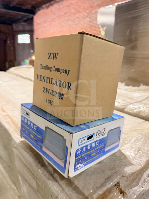 Cardboard boxes labeled ZW Trading Company Ventilator and Cold Storage Decorative Lamps, 20W, sit on bubble wrap.