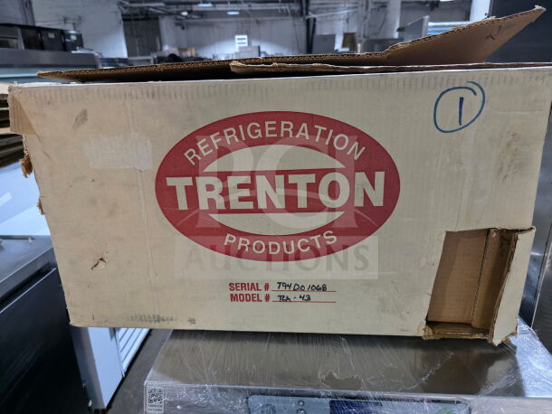 Cardboard box labeled "Trenton Refrigeration Products," containing Trenton low-profile unit cooler model TLA43, serial 704100168.