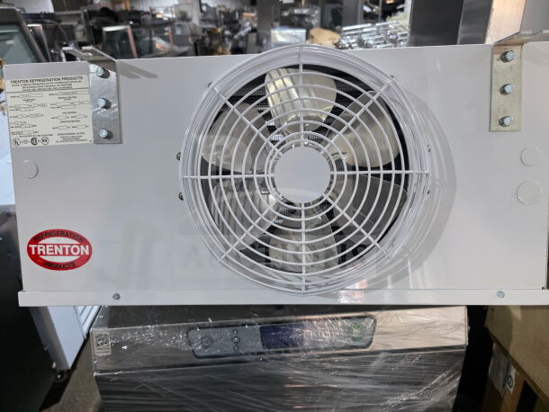 NEW CoolMax walk-in cooler door, Continental DL4882, with Trenton TLA43 evaporator. Condition: New. Tags show model details.
