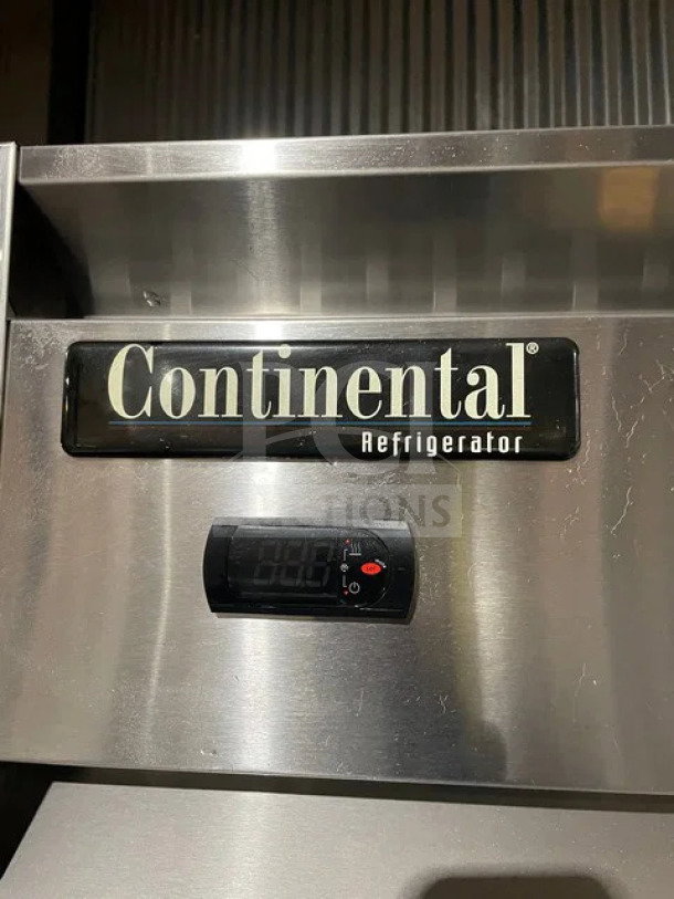 Continental 2RN stainless steel 2-door reach-in refrigerator with poly coated wire rack, door locks, keys, and casters.