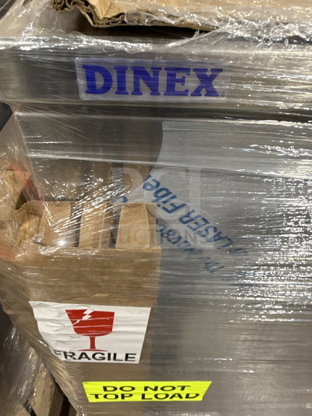 Brand new Dinex stainless steel meal delivery tray cart, heavy-duty, commercial grade. Labels indicate fragile, do not top load.