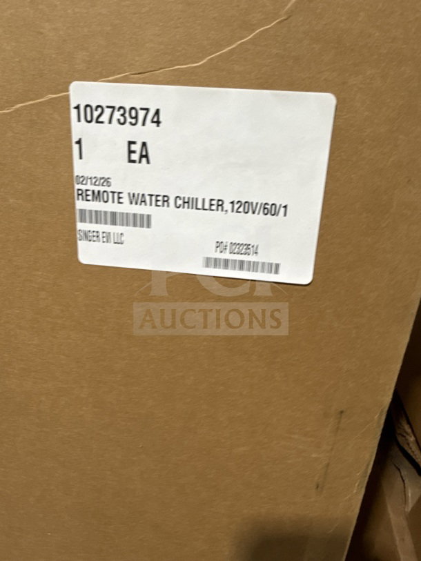 Alt text: Crysalli 6-gallon stainless steel electric under-counter water chiller, model CR-UCM2, in original packaging.