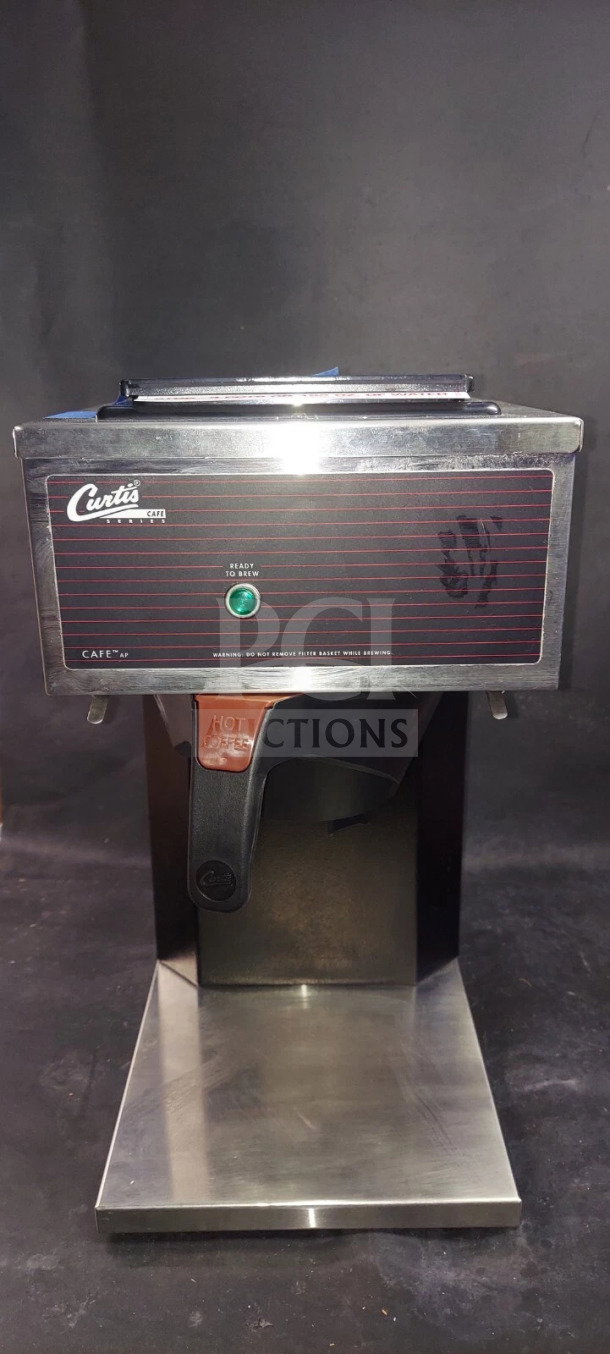 Brand new Curtis countertop coffee brewing machine, model CAFE0AP10A000, 120V, 1-Phase, SN: 15160854, stainless finish.